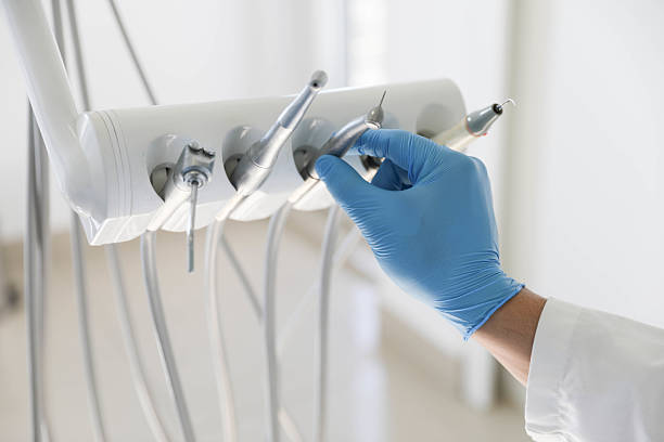 Professional Tooth Extraction technician working in Midway, KY